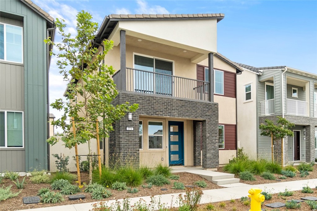 374 Baluster Irvine, CA 92618 - Photo 44 of 64 a front view of a house with garden