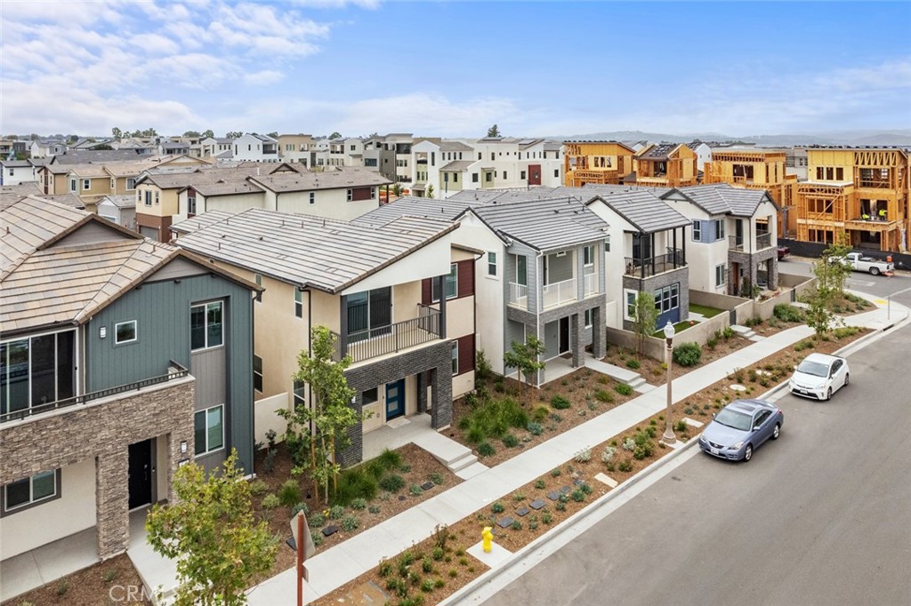 374 Baluster Irvine, CA 92618 - Photo 46 of 64 an aerial view of multiple houses with a big yard