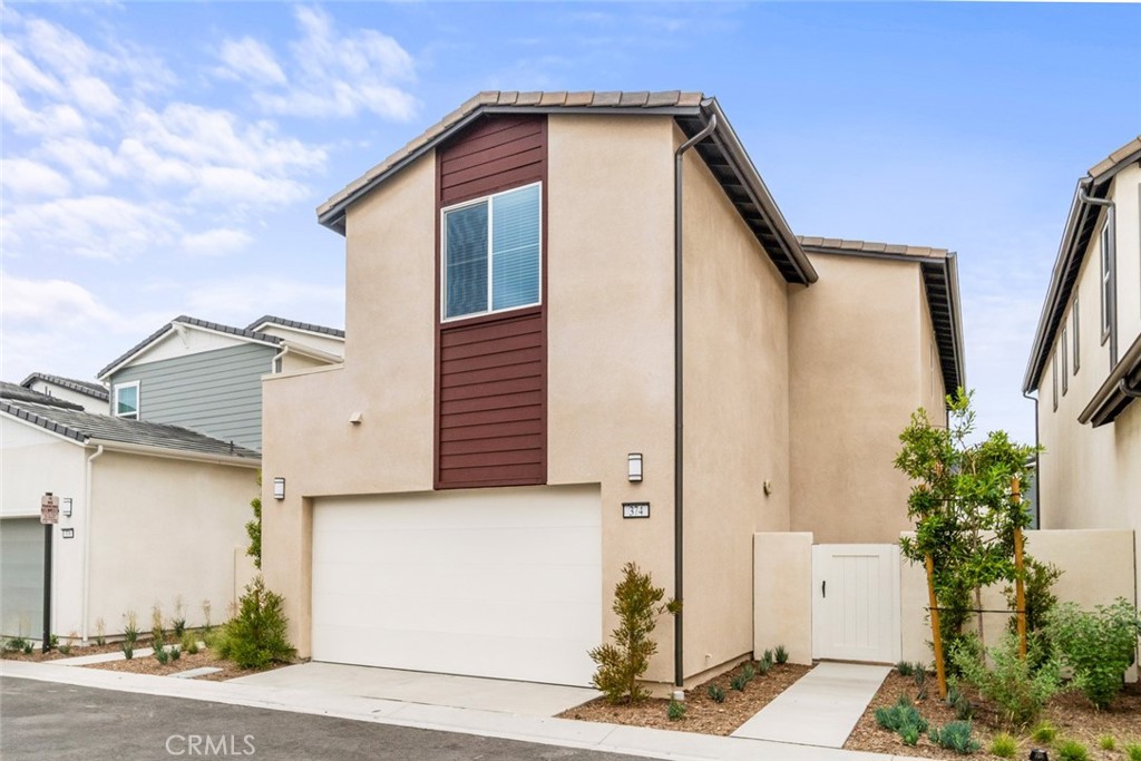 374 Baluster Irvine, CA 92618 - Photo 49 of 64 a front view of a house with plants