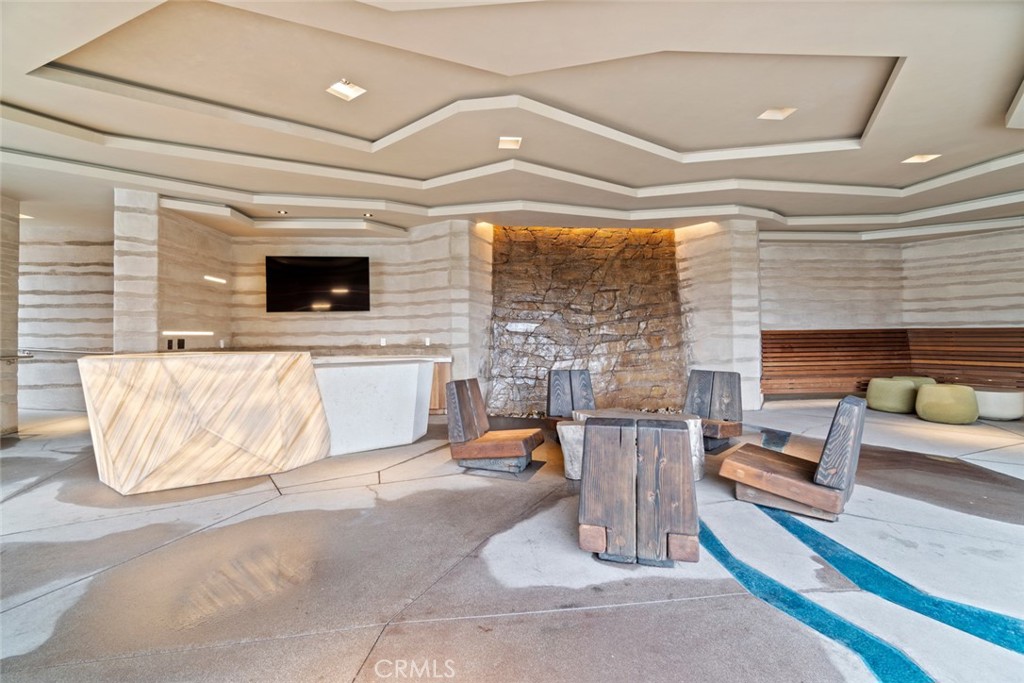 374 Baluster Irvine, CA 92618 - Photo 59 of 64 a living room with patio furniture and a flat screen tv