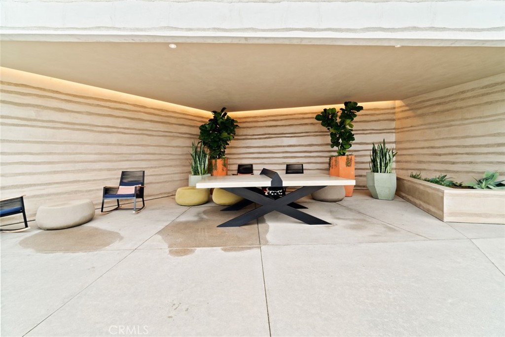 374 Baluster Irvine, CA 92618 - Photo 60 of 64 a view of table and chairs in patio