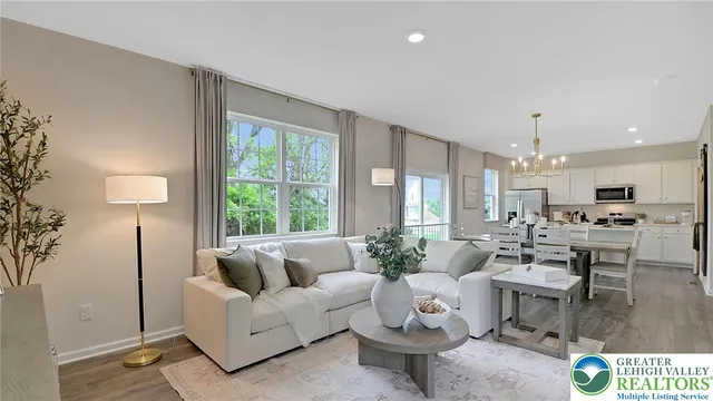 a view of a hallway with an entryway