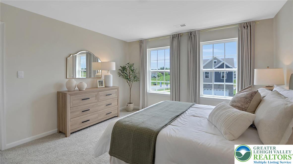109 Winding Road Easton, PA 18040 - Photo 23 of 29 a bedroom with a bed and a large window