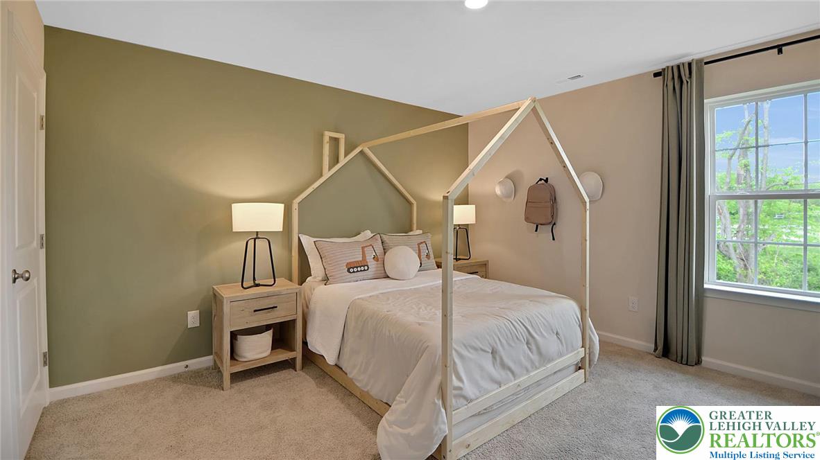 109 Winding Road Easton, PA 18040 - Photo 24 of 29 a bedroom with a bed and a window