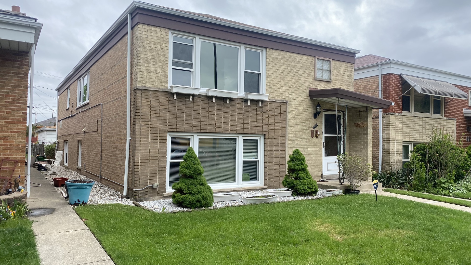 3419 South 54th Avenue, Unit 2 Cicero, IL 60804 - Photo 1 of 1 a view of a house with a yard and plants