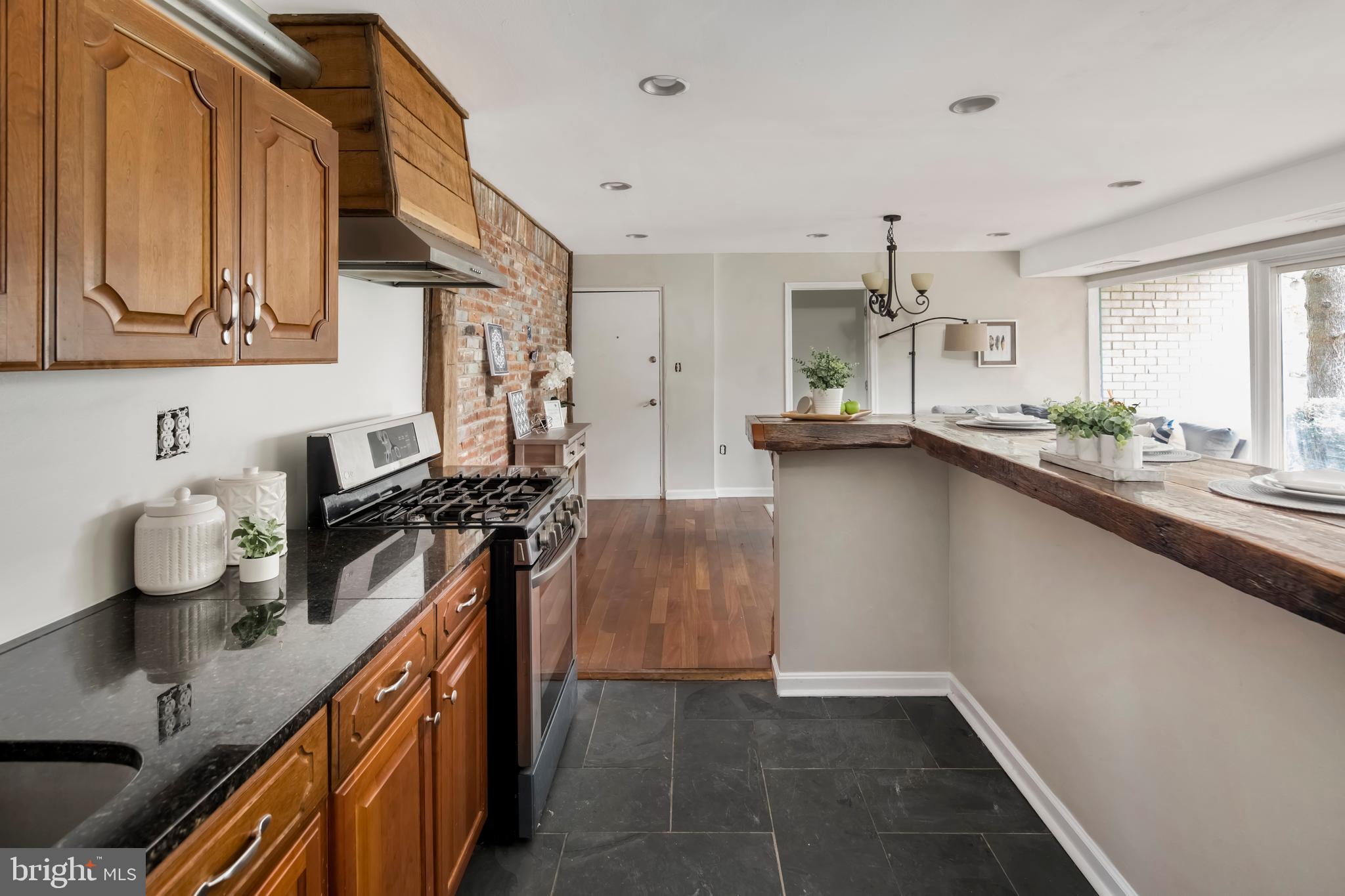 9274 Adelphi Road, Unit 12 Hyattsville, MD 20783 - Photo 3 of 16 Gorgeous cabinetry and updated countertop