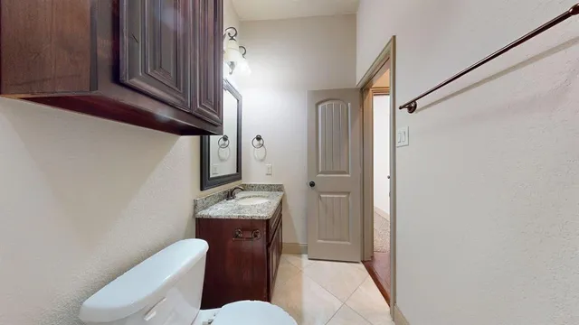 a bathroom with a sink a toilet and bathtub