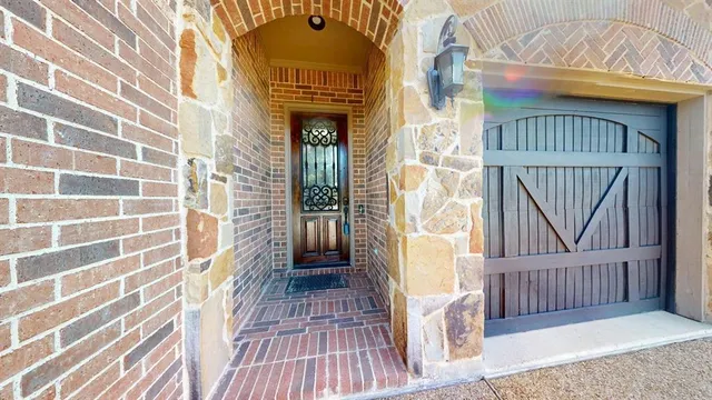 a view of gallery with wooden floor