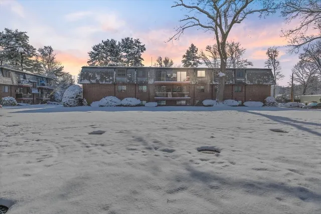 a view of a backyard of the house