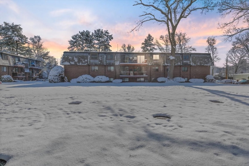 a view of a backyard of the house