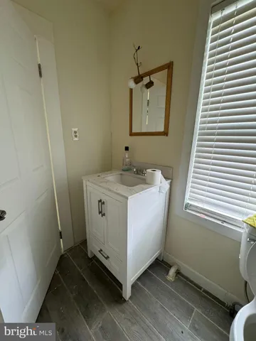 a utility room with closet dryer and washer