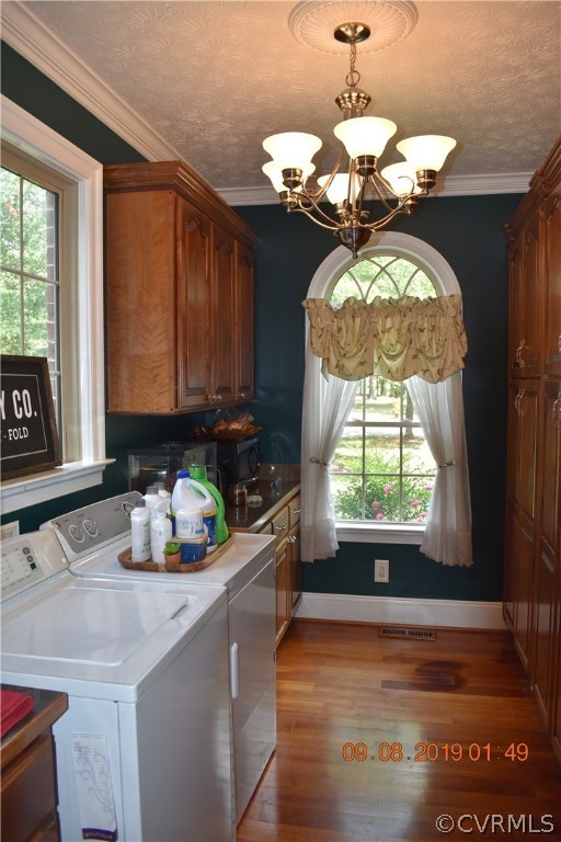 872 Wilson Road Wilsons, VA 23894 - Photo 11 of 34 a dining table with a chandelier