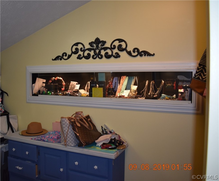 872 Wilson Road Wilsons, VA 23894 - Photo 20 of 34 a kitchen with a shelf and wooden floor