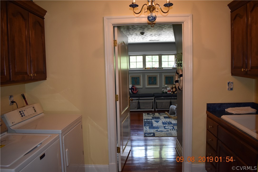 872 Wilson Road Wilsons, VA 23894 - Photo 21 of 34 a bathroom with a sink and a mirror