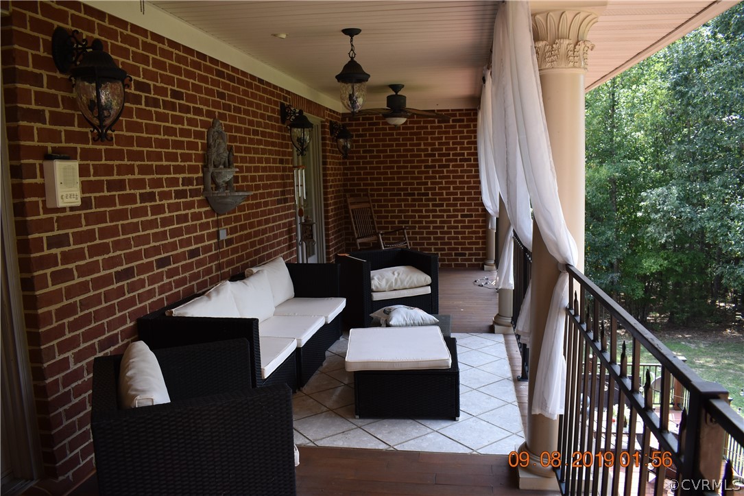 872 Wilson Road Wilsons, VA 23894 - Photo 25 of 34 a view of balcony with wooden floor