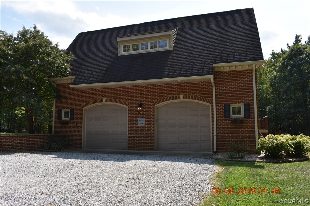 872 Wilson Road Wilsons, VA 23894 - Photo 30 of 34 a front view of a house with garden