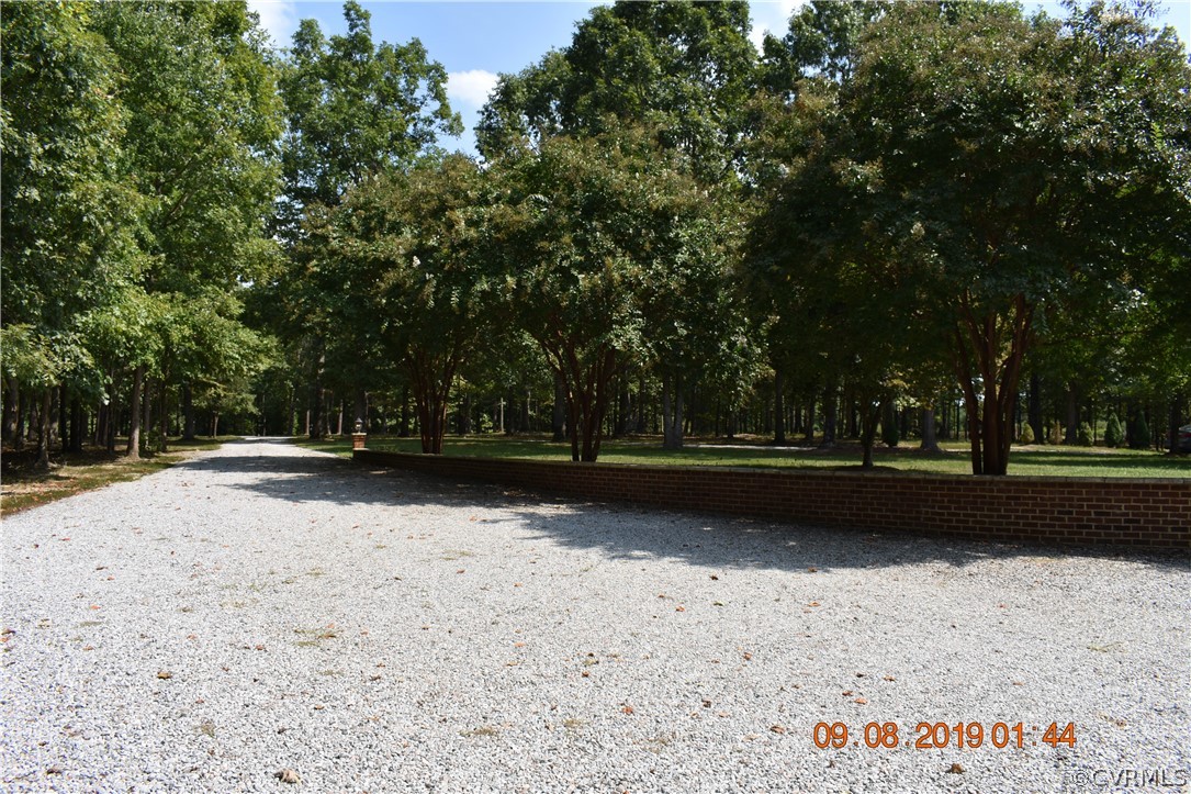 872 Wilson Road Wilsons, VA 23894 - Photo 33 of 34 a view of outdoor space with trees