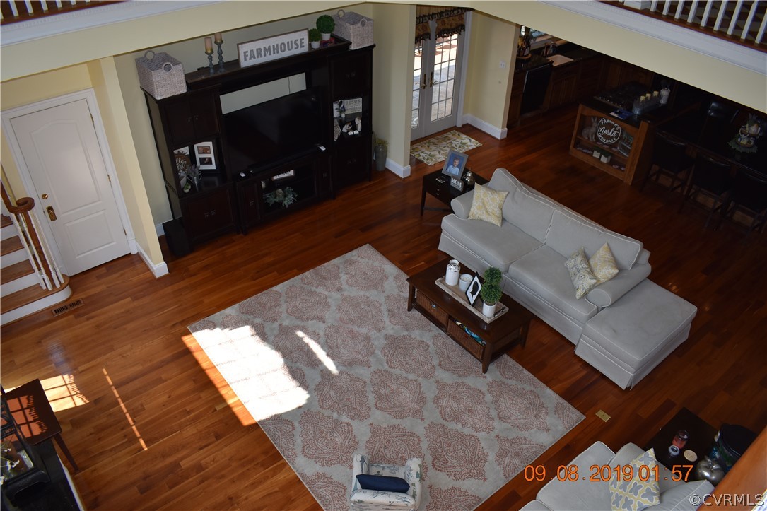 872 Wilson Road Wilsons, VA 23894 - Photo 4 of 34 a living room with furniture and a flat screen tv