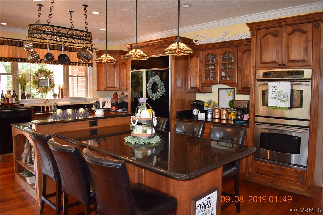 872 Wilson Road Wilsons, VA 23894 - Photo 9 of 34 a dining table with chairs and window