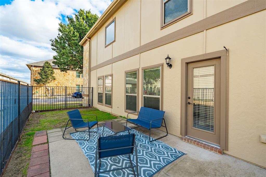 5412 Conch Train Road McKinney, TX 75070 - Photo 15 of 21 a view of a chair and tables back yard of the house