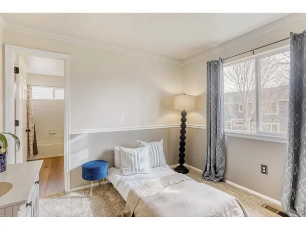 a kitchen with a sink appliances and cabinets