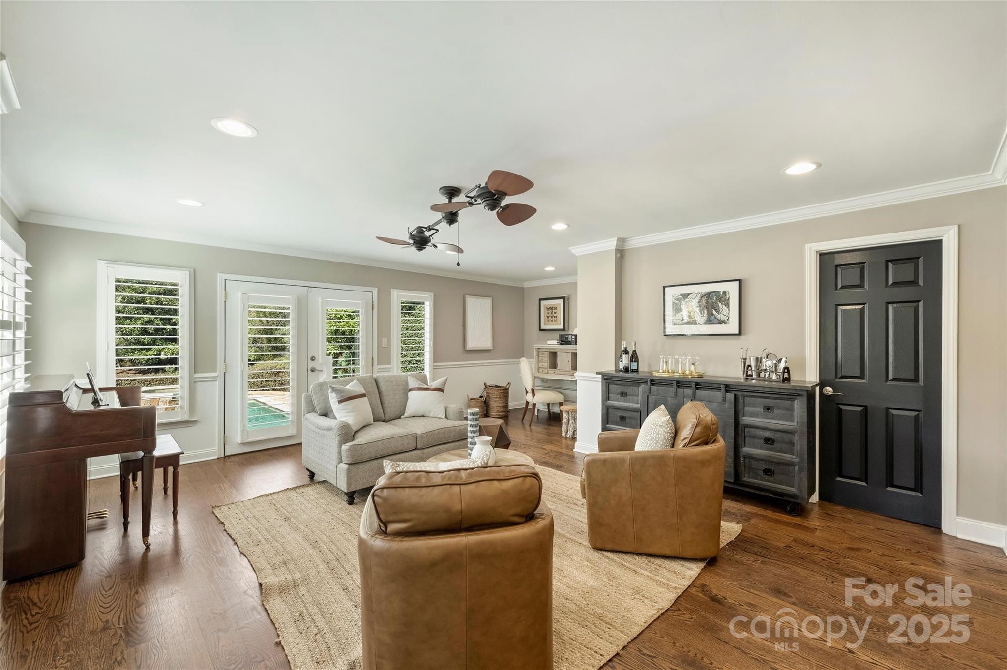 830 Jefferson Drive Charlotte, NC 28270 - Photo 12 of 38 a living room with furniture and a large window