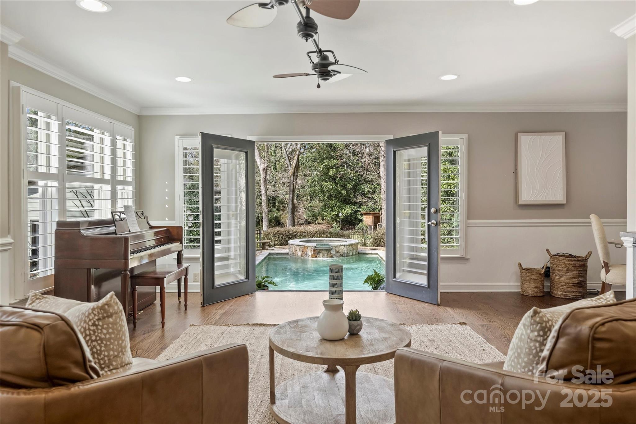 830 Jefferson Drive Charlotte, NC 28270 - Photo 13 of 38 a living room with furniture and large windows