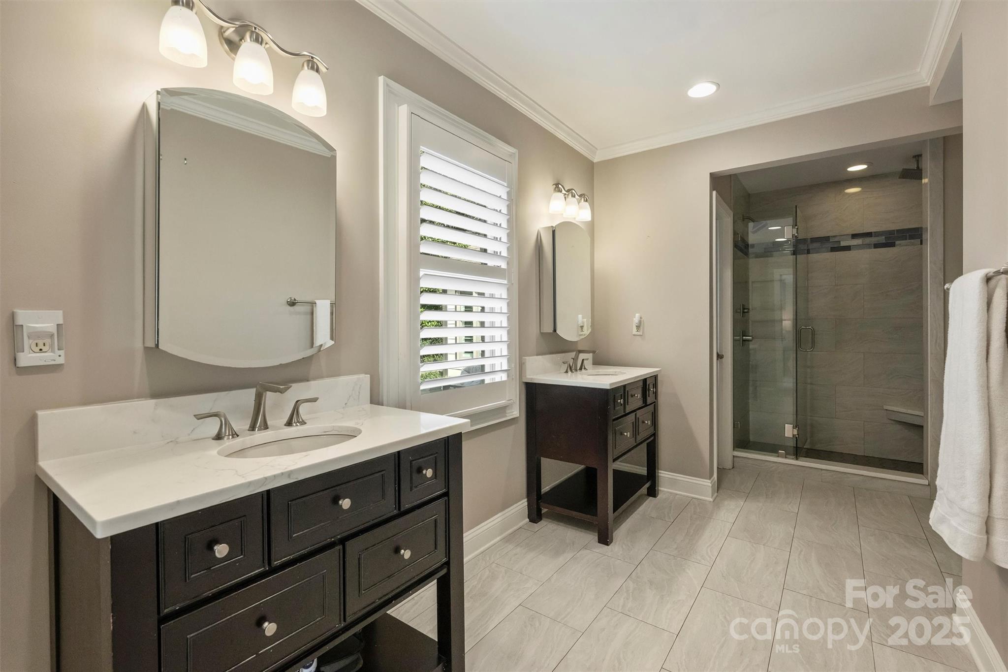 830 Jefferson Drive Charlotte, NC 28270 - Photo 18 of 38 a bathroom with a sink double vanity and a mirror