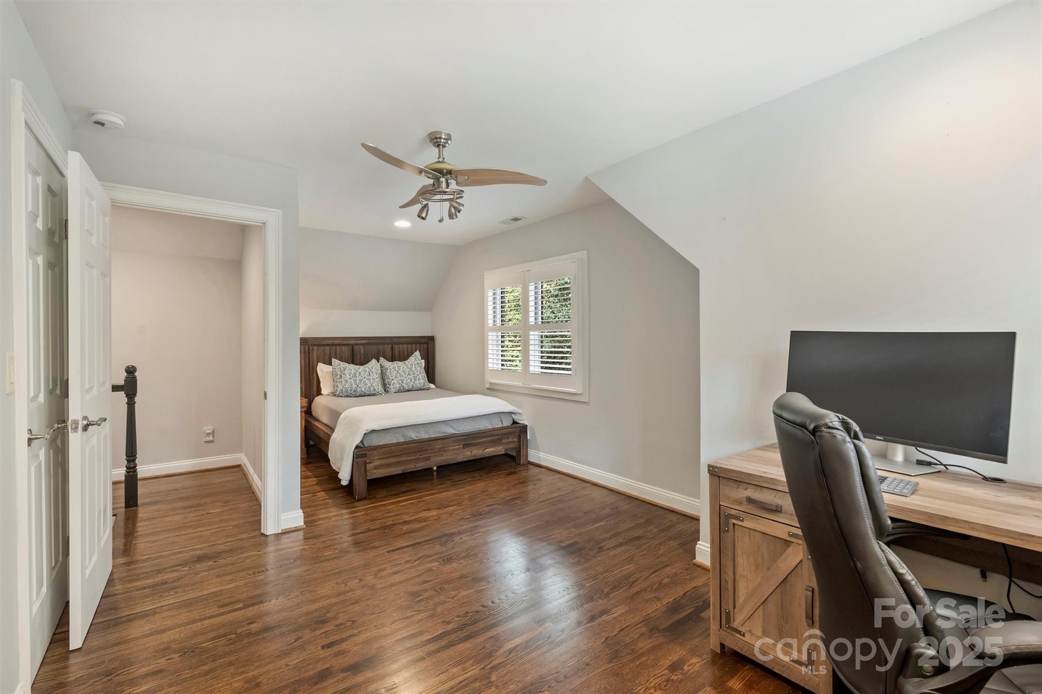 830 Jefferson Drive Charlotte, NC 28270 - Photo 20 of 38 a bedroom with a bed and a desk
