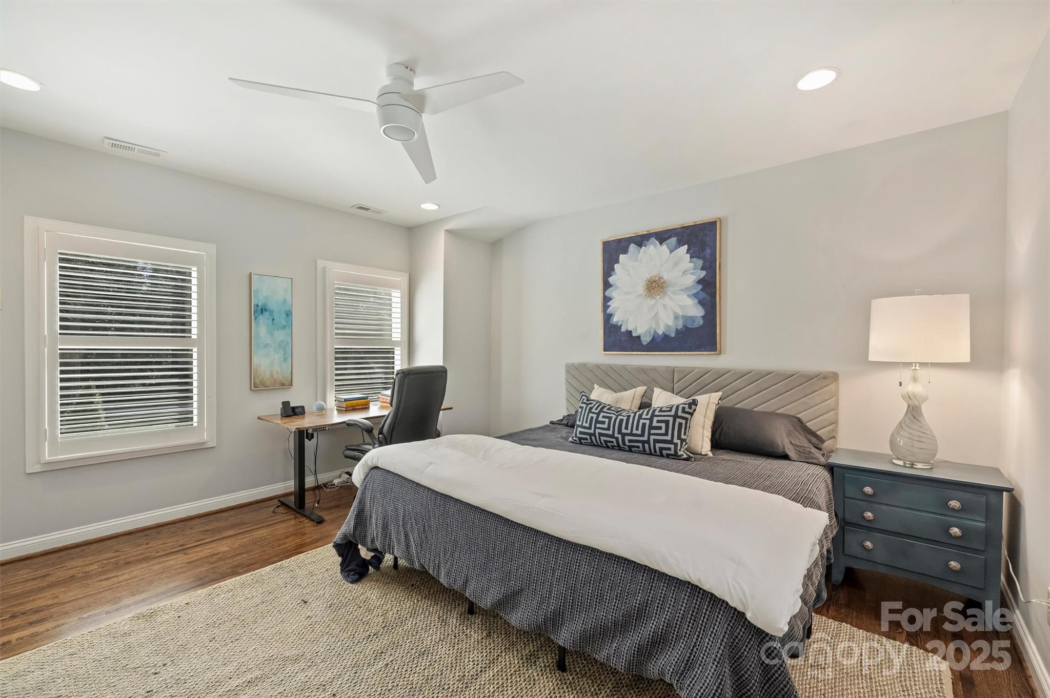 830 Jefferson Drive Charlotte, NC 28270 - Photo 28 of 38 a bedroom with a bed and wooden floor