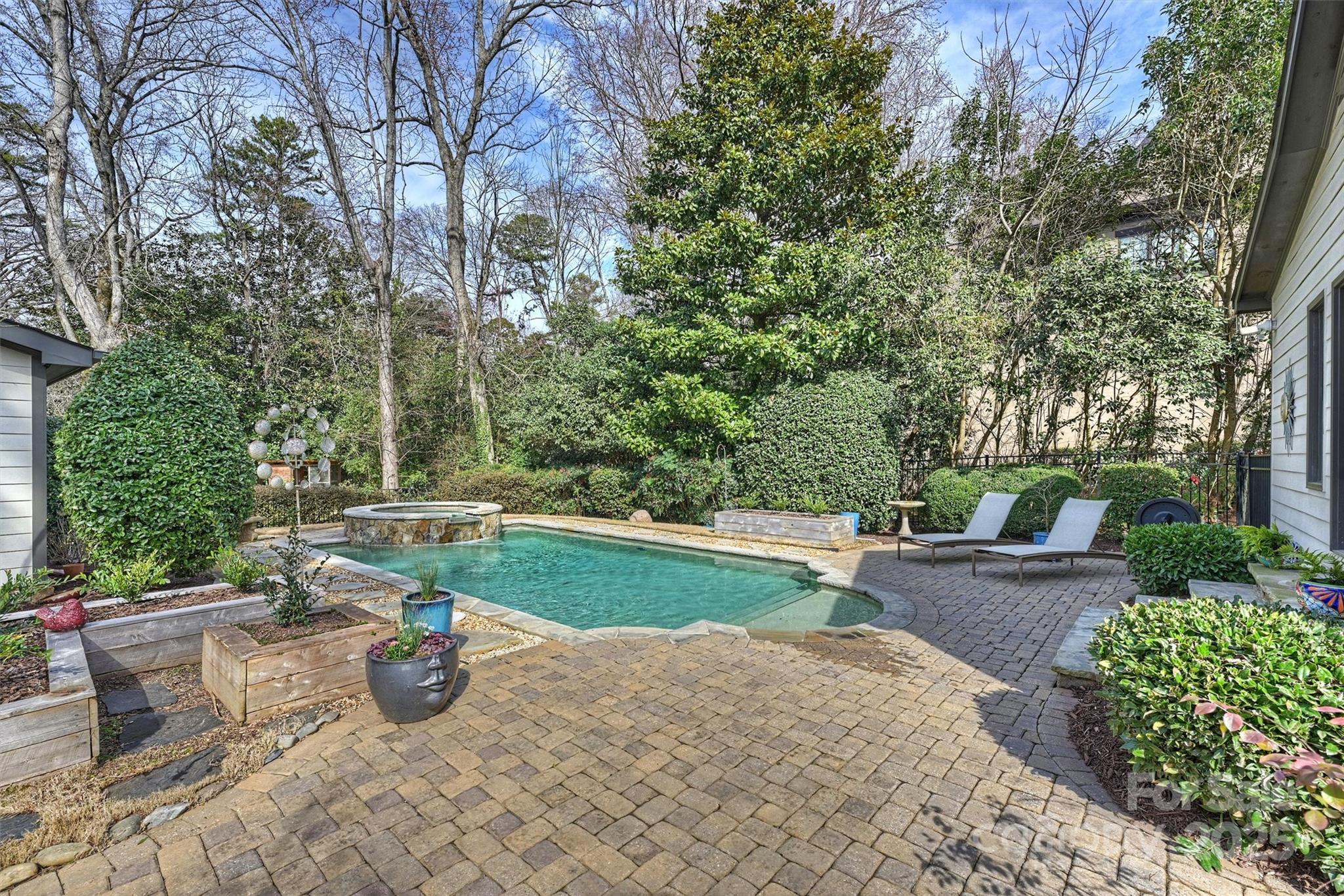 830 Jefferson Drive Charlotte, NC 28270 - Photo 29 of 38 a view of a backyard with sitting area