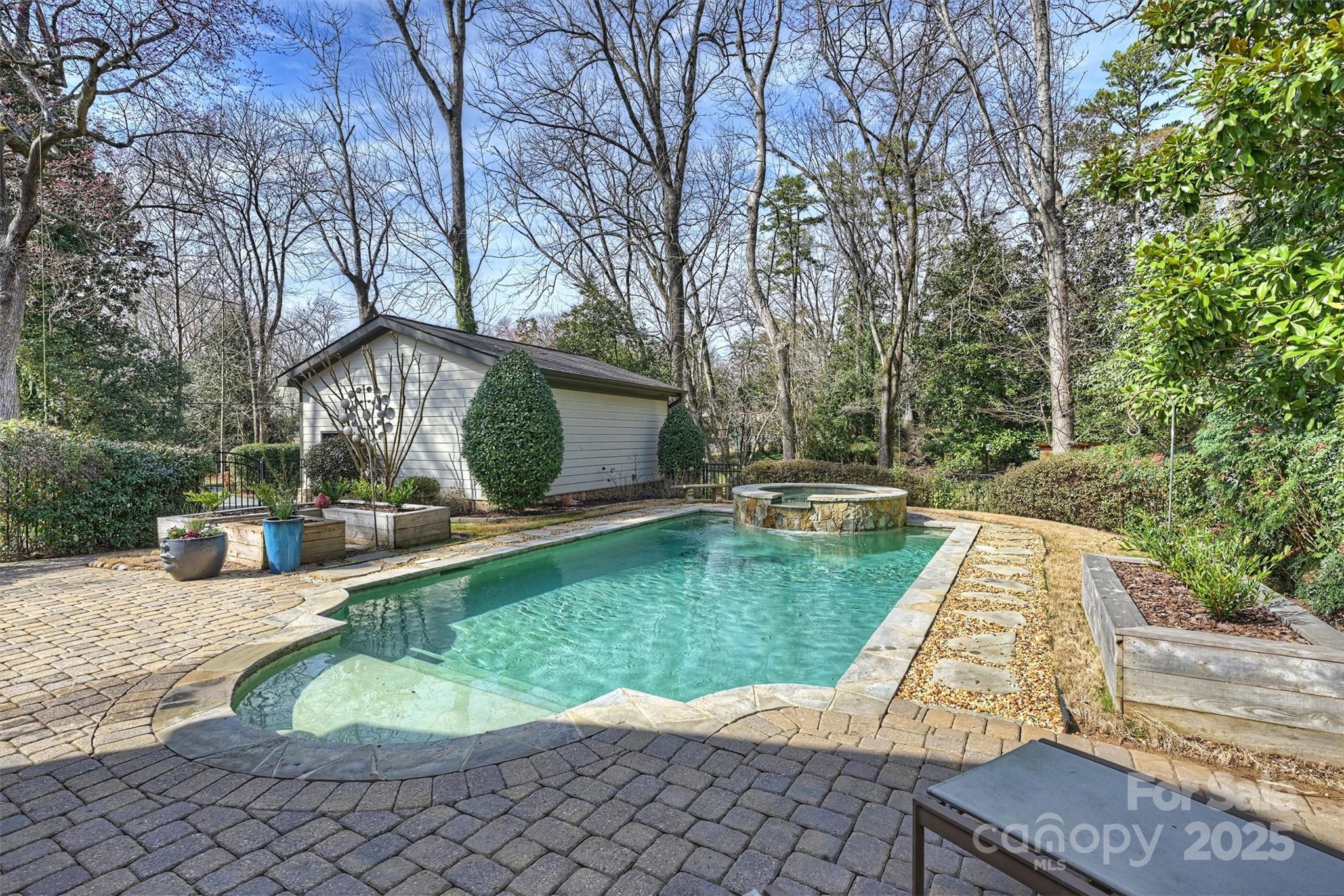 830 Jefferson Drive Charlotte, NC 28270 - Photo 30 of 38 a view of a swimming pool with a patio
