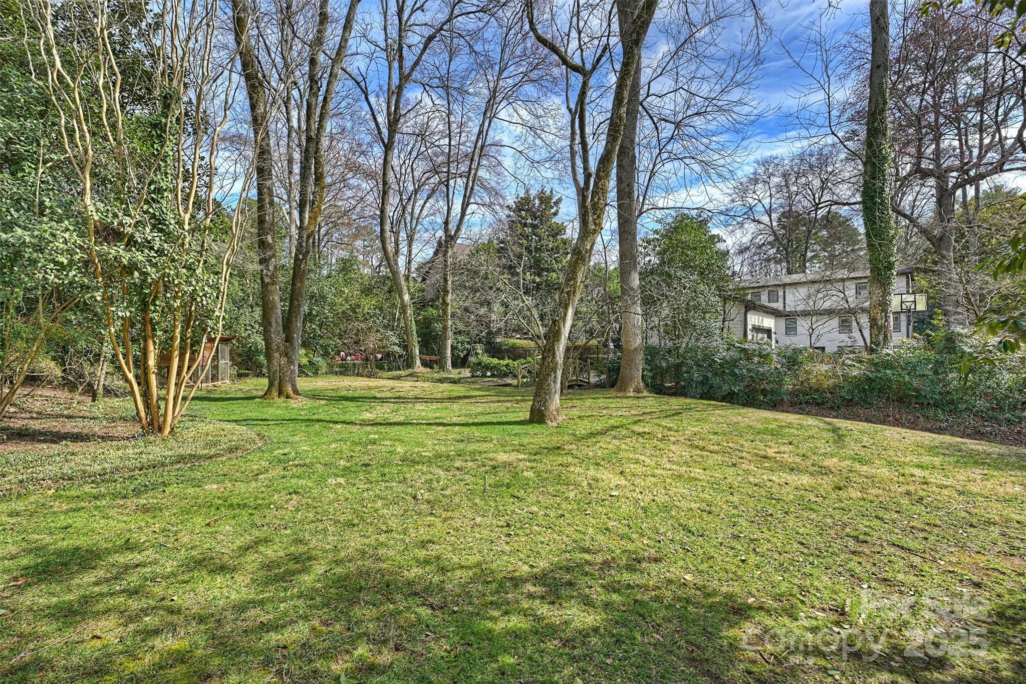 830 Jefferson Drive Charlotte, NC 28270 - Photo 37 of 38 a view of a playground with a tree