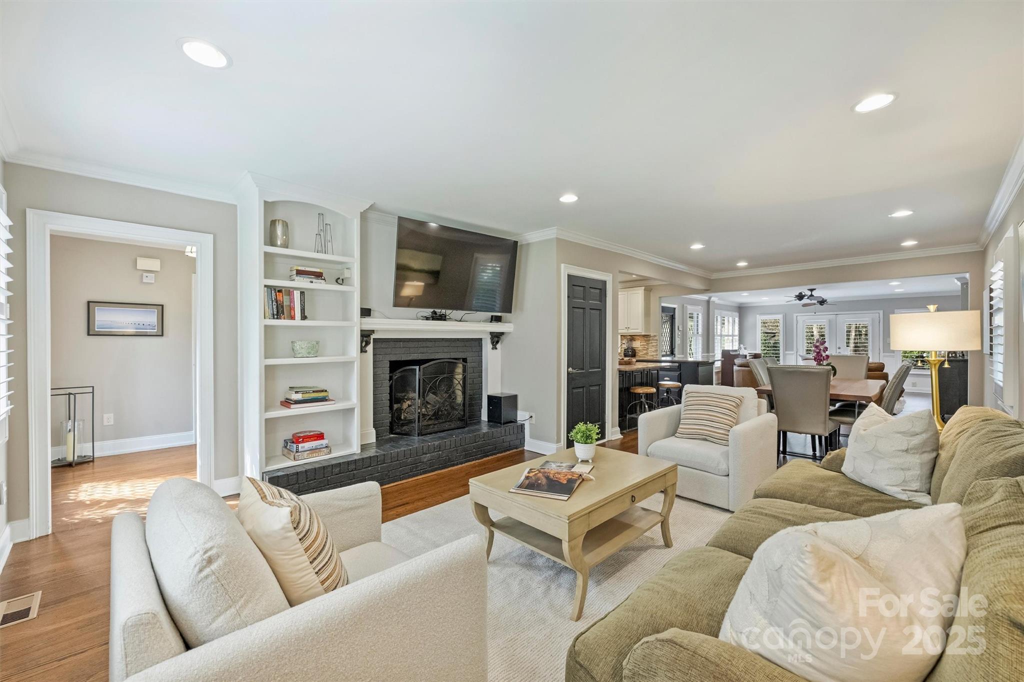 830 Jefferson Drive Charlotte, NC 28270 - Photo 4 of 38 a living room with fireplace furniture and a flat screen tv