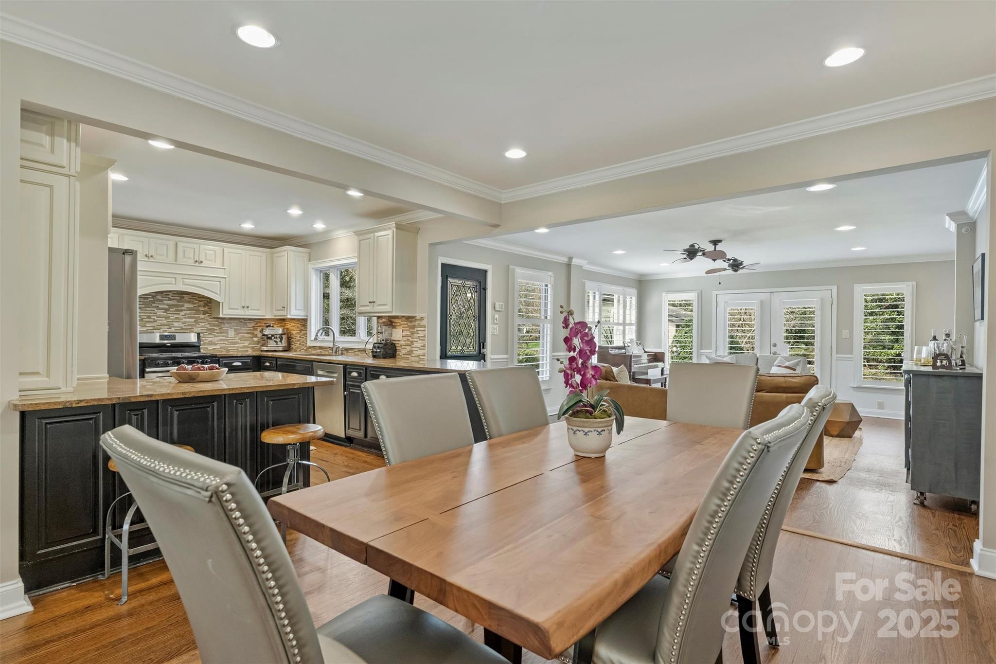 830 Jefferson Drive Charlotte, NC 28270 - Photo 7 of 38 a view of a dining room with furniture and wooden floor