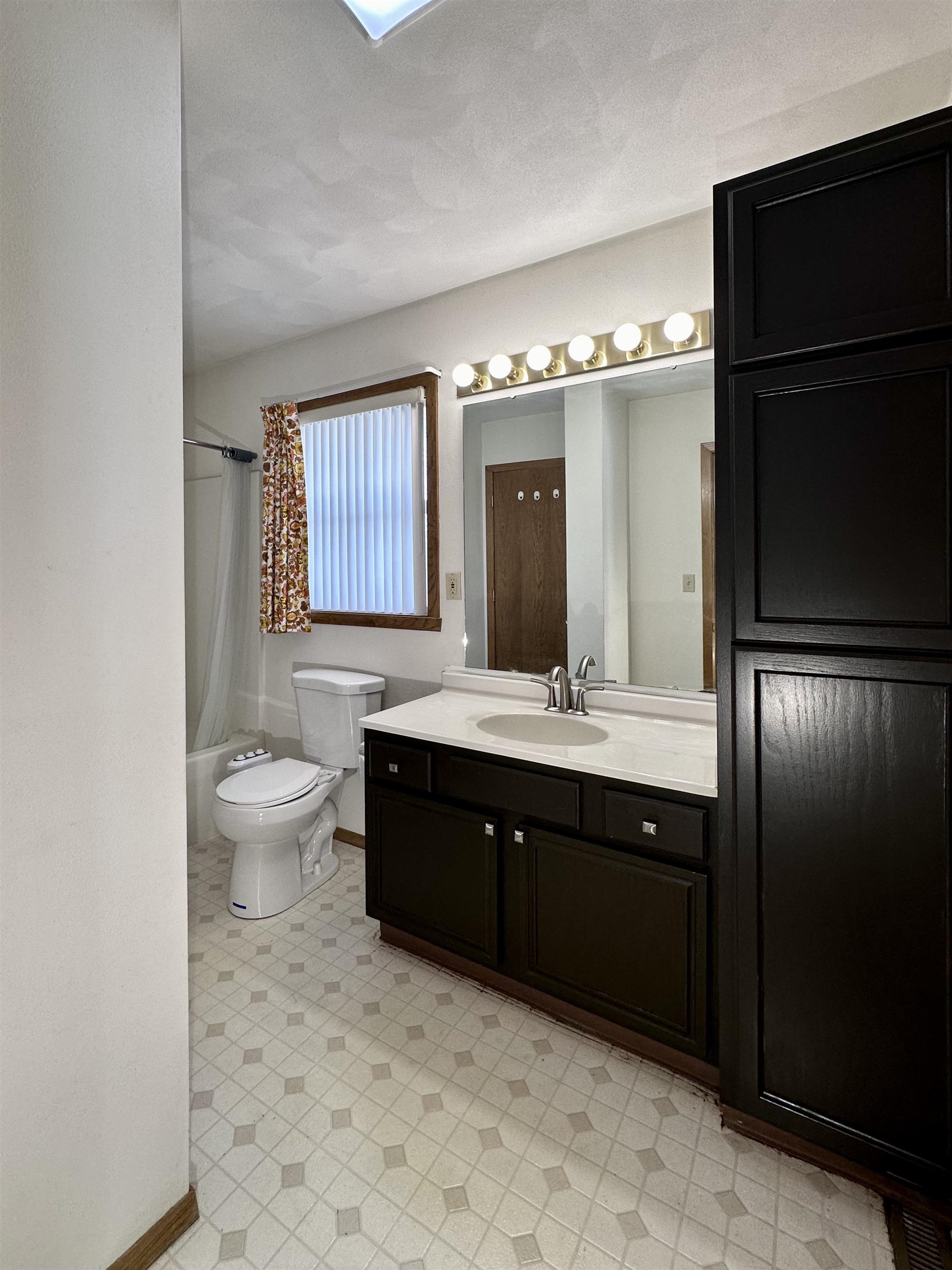 6497 Maeve Lane Rockford, IL 61107 - Photo 14 of 24 a spacious bathroom with a bathtub sink mirror and toilet