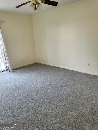 a view of a room with an empty space