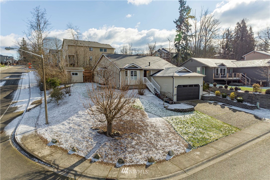 25904 202nd Avenue Southeast Covington, WA 98042 - Photo 1 of 24 a view of a house with entertaining space