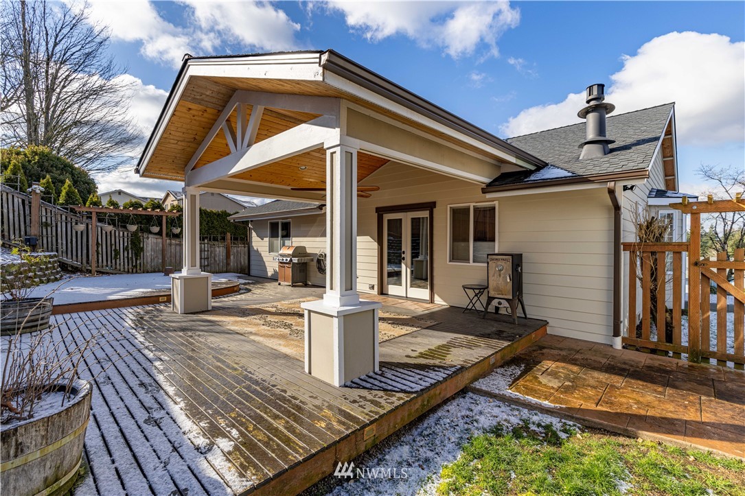 25904 202nd Avenue Southeast Covington, WA 98042 - Photo 20 of 24 a view of a house with sitting area and furniture