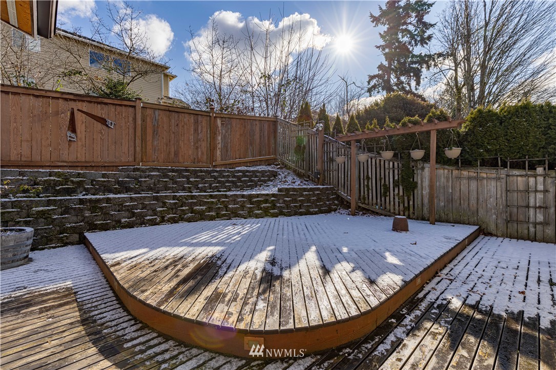 25904 202nd Avenue Southeast Covington, WA 98042 - Photo 21 of 24 a view of a backyard with wooden fence