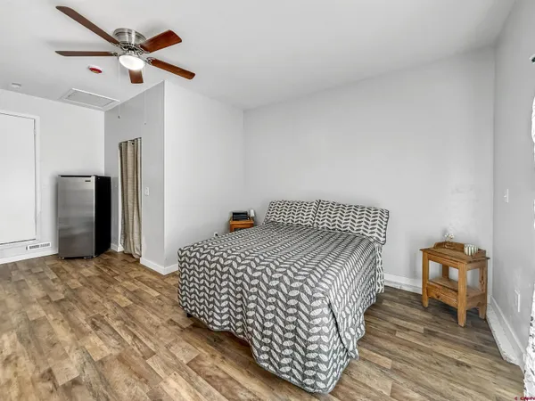 a room with a bed and a window