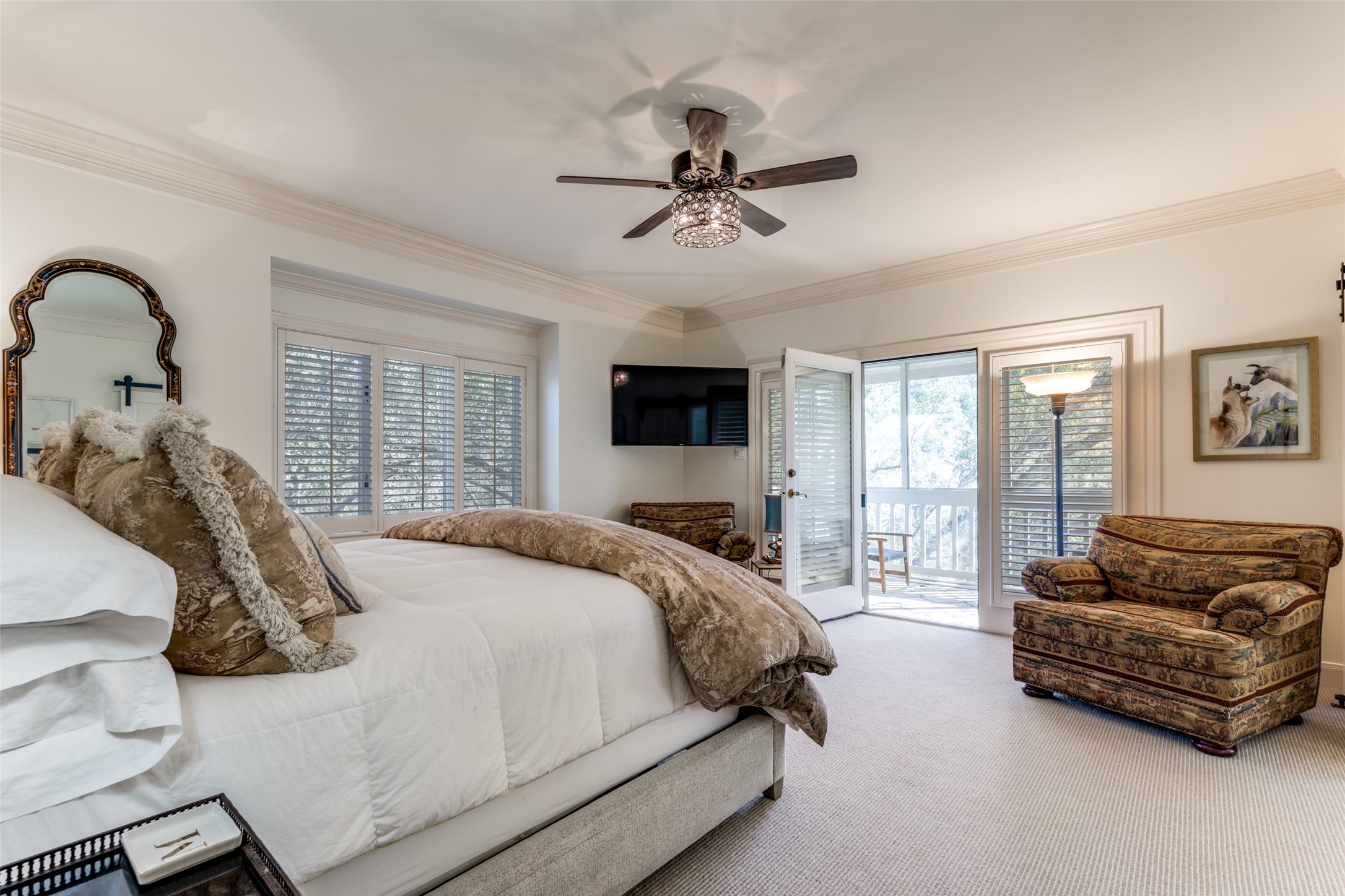 6815 Cougar Run Austin, TX 78731 - Photo 11 of 27 Primary bedroom opening to outside screened in porch