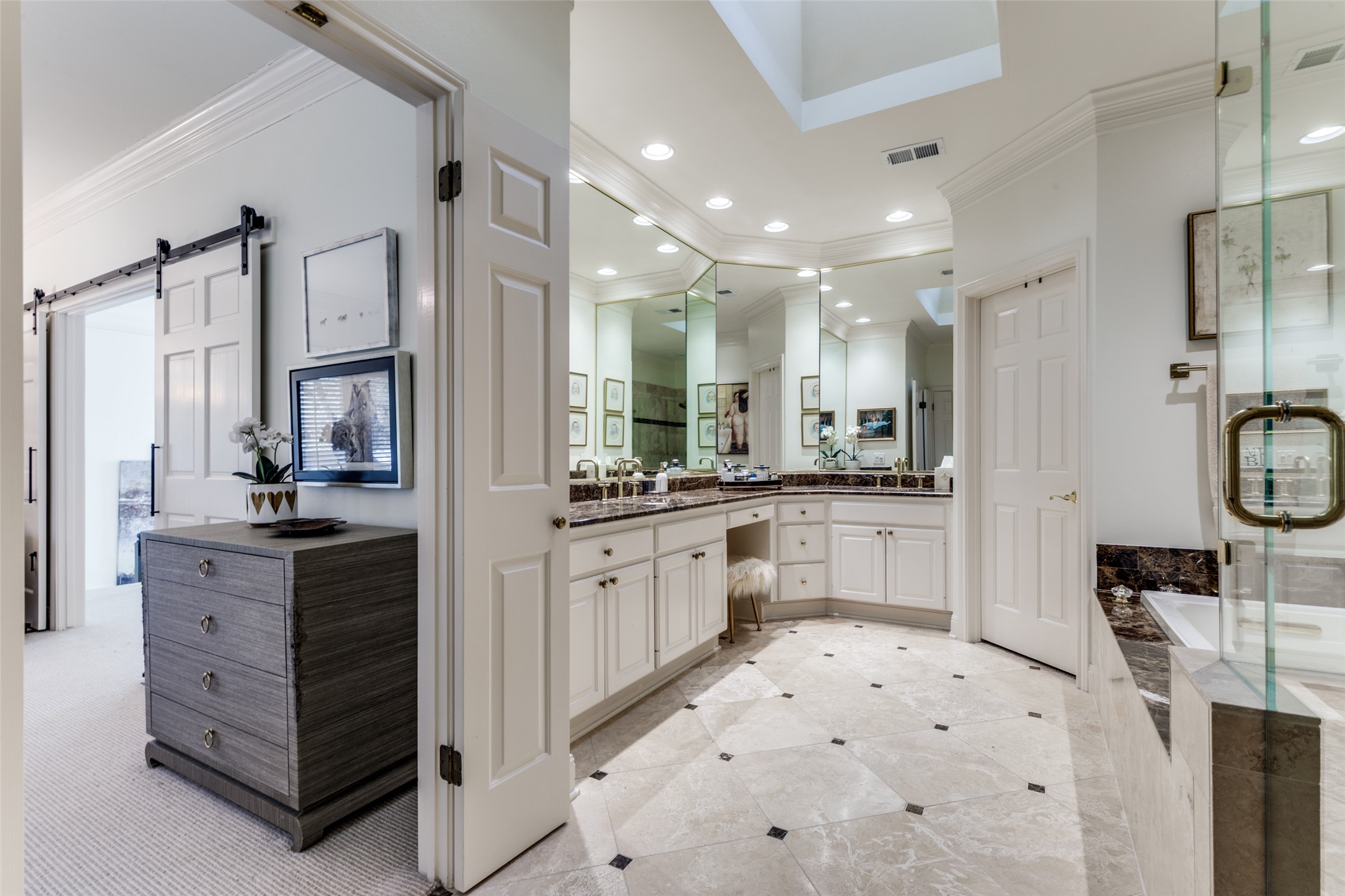 6815 Cougar Run Austin, TX 78731 - Photo 12 of 27 Primary bathroom with massaging tub, walk in showere and two big walk in closets