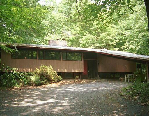72 Gallows Hill Road Redding, CT 06896 - Photo 1 of 1 a backyard of a house with lots of green space