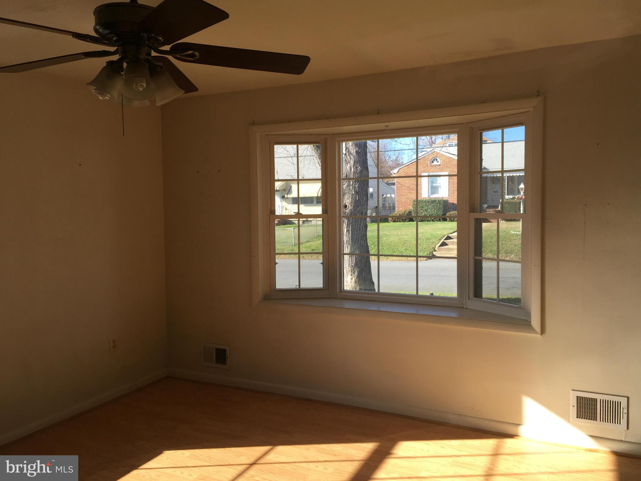 241 Carroll Road Pasadena, MD 21122 - Photo 7 of 16 Living Room with Bay Window