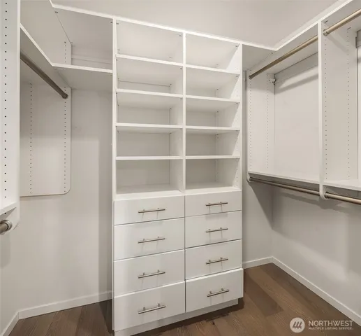 a view of an empty walk in closet