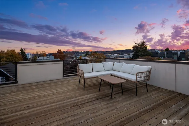 a view of a terrace with sitting area