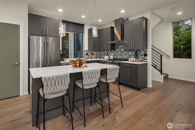 a kitchen with a table and chairs in it