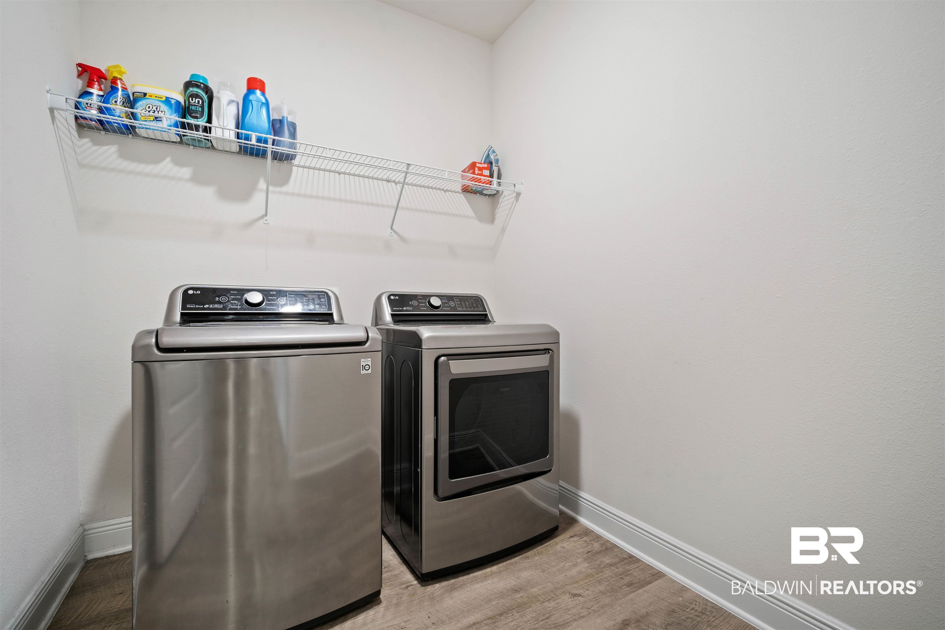 11021 Native Dancer Way Daphne, AL 36526 - Photo 24 of 35 Washroom with baseboards, wood finished floors, separate washer and dryer, and laundry area