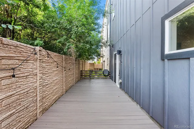 a view of a pathway with a wooden door